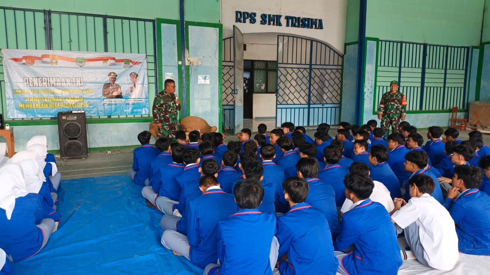 Kodim 0509 Bekasi Gelar Penyuluhan Penerimaan TNI di SMK Trisima Cibarusah Dalam Suasana TMMD ke-129